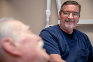 Dr Brand with dental patient Ocala , FL